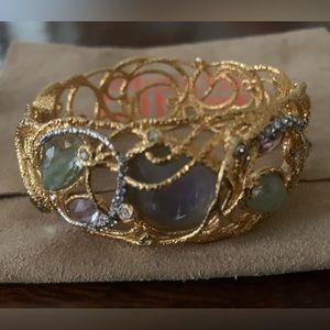Alexis Bittar gold hinge cuff with set in stones and crystals